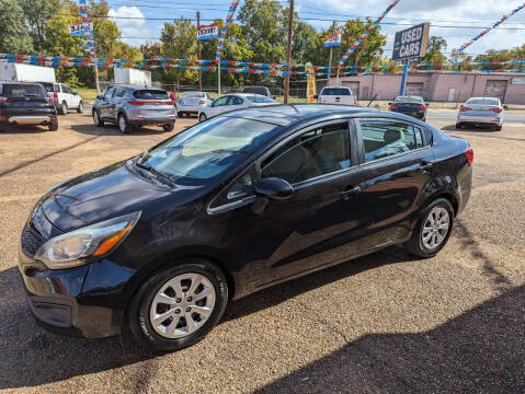 2015 Kia Rio for sale at Paw Paw's Used Cars in Alexandria LA