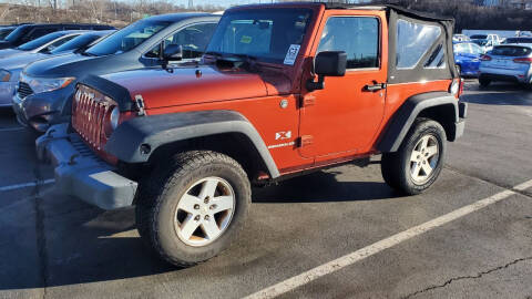 2009 Jeep Wrangler for sale at A&R Auto Sales and Services LLC in Connersville IN