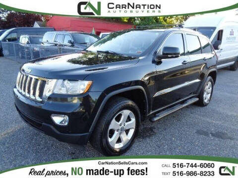 2013 Jeep Grand Cherokee for sale at CarNation AUTOBUYERS Inc. in Rockville Centre NY