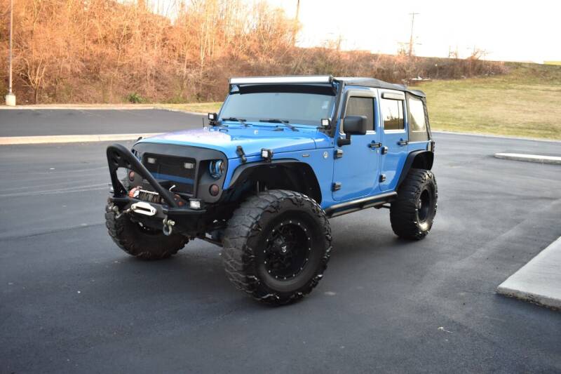 2012 Jeep Wrangler Unlimited for sale at Alpha Motors in Knoxville TN