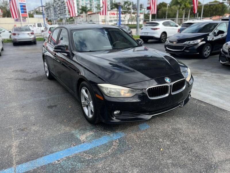 2015 BMW 3 Series for sale at THE SHOWROOM in Miami FL