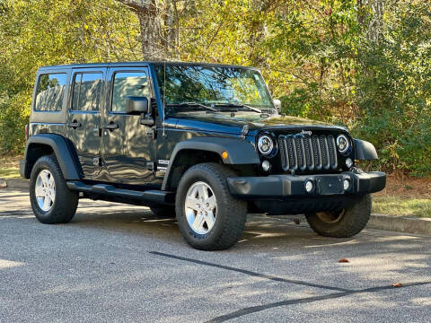 2014 Jeep Wrangler Unlimited for sale at H and S Auto Group in Canton GA