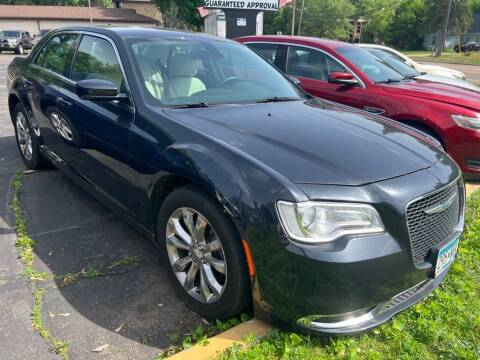 2017 Chrysler 300 for sale at Chinos Auto Sales in Crystal MN
