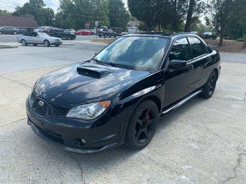 2006 Subaru Impreza for sale at Alpha Car Land LLC in Snellville GA