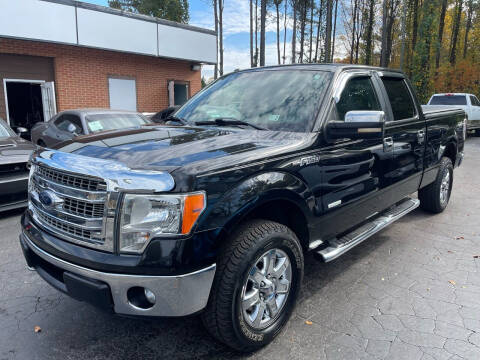 2013 Ford F-150 for sale at Magic Motors Inc. in Snellville GA