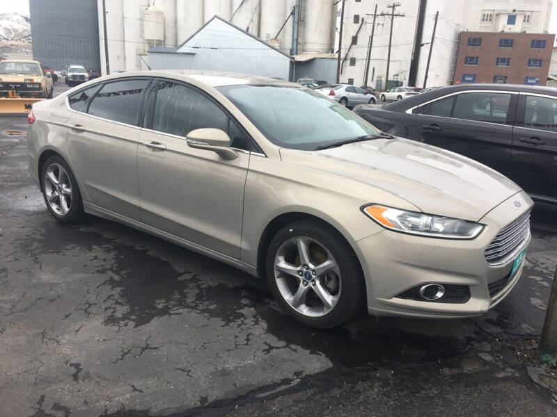 2015 Ford Fusion for sale at R & J Auto Sales in Pocatello ID