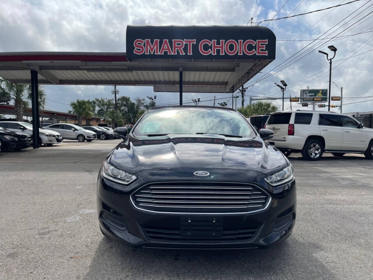 2014 Ford Fusion for sale at SMART CHOICE AUTO in Pasadena, TX