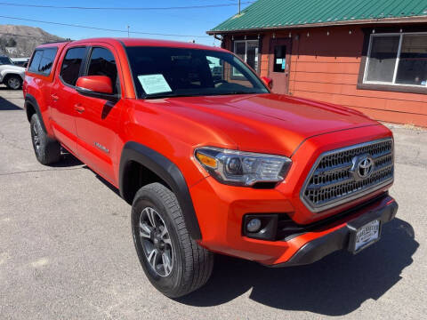 2017 Toyota Tacoma for sale at BERKENKOTTER MOTORS in Brighton CO