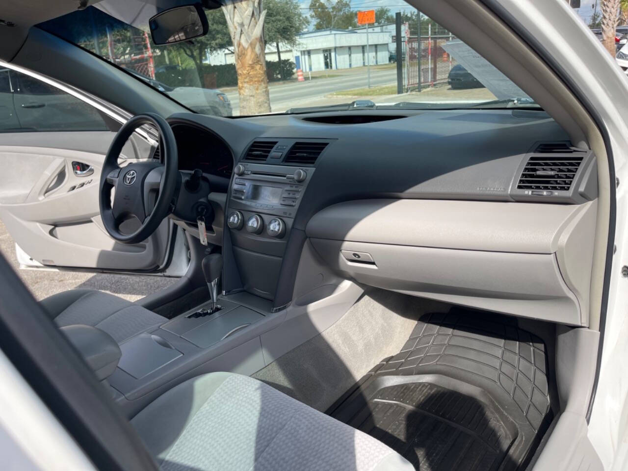 2011 Toyota Camry for sale at SMART CHOICE AUTO in Pasadena, TX