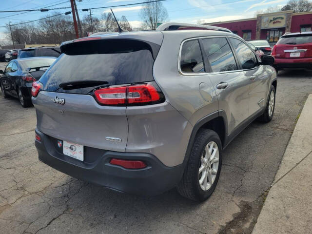 2015 Jeep Cherokee for sale at DAGO'S AUTO SALES LLC in Dalton, GA