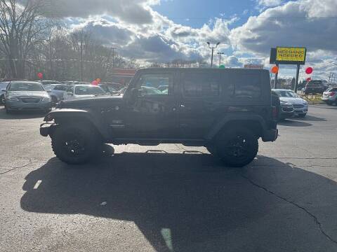 2009 Jeep Wrangler Unlimited for sale at Car Zone in Otsego MI