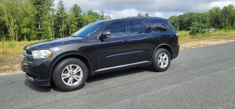 2011 Dodge Durango for sale at Hometown Automotive Service & Sales in Holliston MA