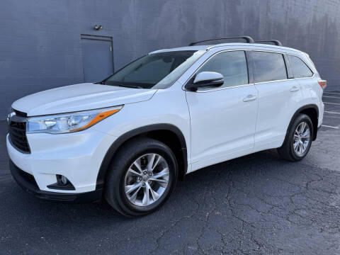 2015 Toyota Highlander for sale at Kohmann Motors in Minerva OH