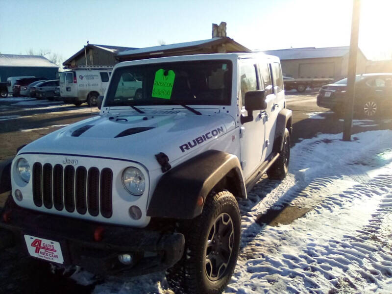 2016 Jeep Wrangler Unlimited for sale at Four Guys Auto in Cedar Rapids IA