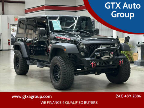 2016 Jeep Wrangler Unlimited for sale at GTX Auto Group in West Chester OH