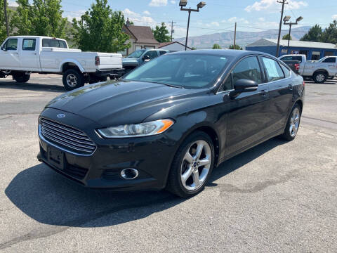 2013 Ford Fusion for sale at R & J Auto Sales in Pocatello ID