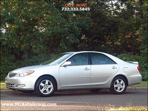 2004 Toyota Camry for sale at M2 Auto Group Llc. EAST BRUNSWICK in East Brunswick NJ