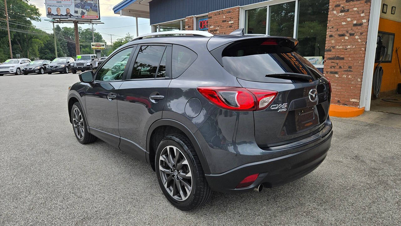 2016 Mazda CX-5 for sale at North Ridge Auto Center LLC in Madison, OH