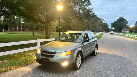 2009 Subaru Outback for sale at CARZLOT in Portsmouth VA