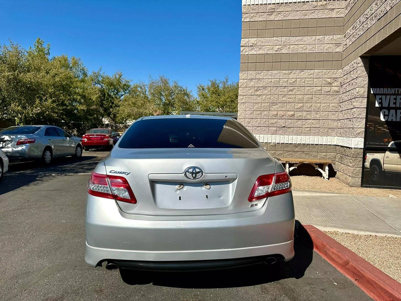 2010 Toyota Camry for sale at HUDSONS AUTOS in Gilbert, AZ