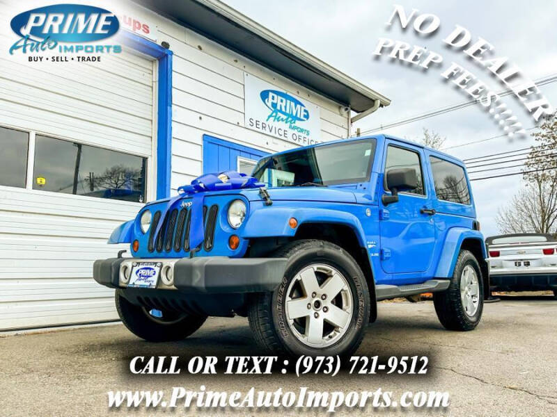 https://cdn05.carsforsale.com/00d6885bb3b0ff2debac9761ac046bb4a6/800x600/2011-jeep-wrangler-sahara-4x4-2dr-suv.jpg