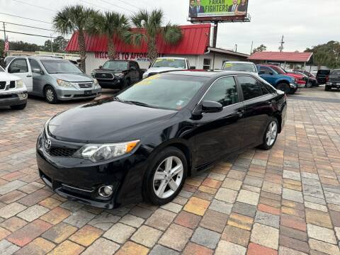 2014 Toyota Camry for sale at Affordable Auto Motors in Jacksonville FL