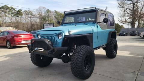 1998 Jeep Wrangler for sale at DADA AUTO INC in Monroe NC