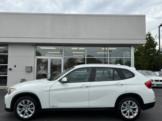 2013 BMW X1 for sale at Opus Motorcars in Utica, MI