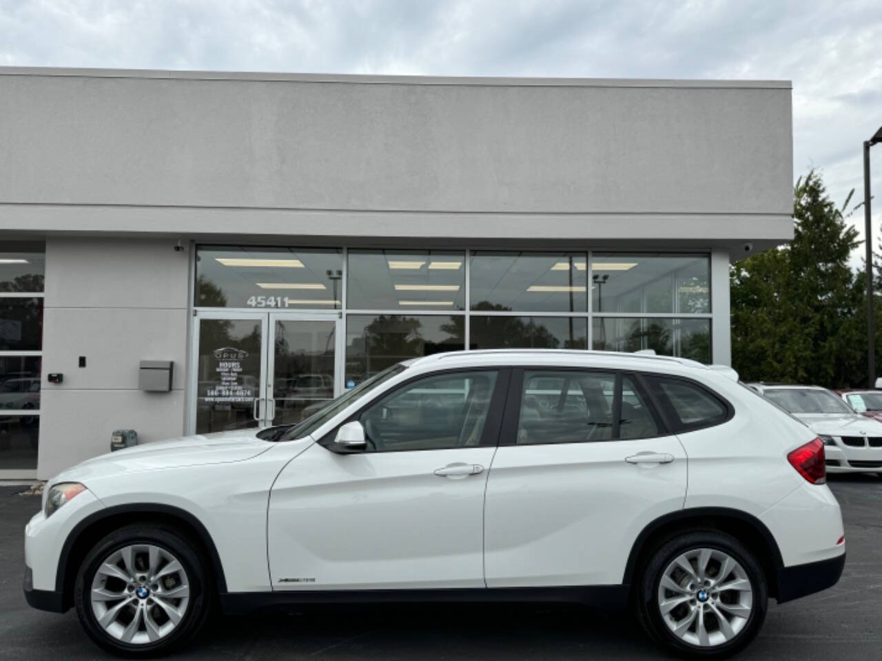 2013 BMW X1 for sale at Opus Motorcars in Utica, MI