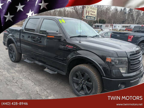 2014 Ford F-150 for sale at TWIN MOTORS in Madison OH