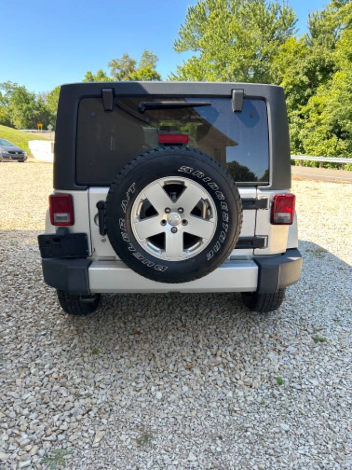 2012 Jeep Wrangler Unlimited for sale at STRODES AUTO GROUP LLP in Malta, OH