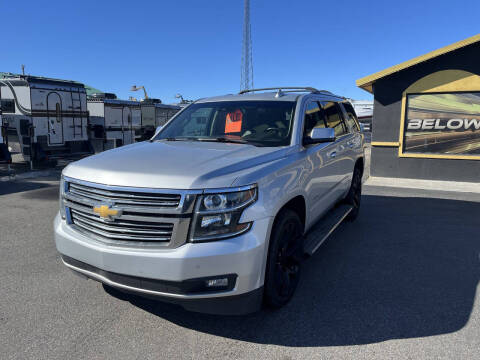 2015 Chevrolet Tahoe for sale at BELOW BOOK AUTO SALES in Idaho Falls ID
