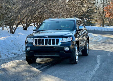 2012 Jeep Grand Cherokee for sale at Northstar Auto Sales LLC in Ham Lake MN