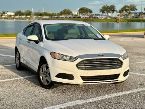 2014 Ford Fusion for sale at EASYCAR GROUP in Orlando FL