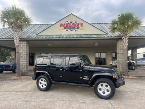 2015 Jeep Wrangler Unlimited for sale at Rabeaux's Auto Sales in Lafayette LA