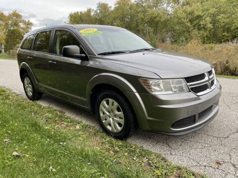 2013 Dodge Journey for sale at VILLAGE AUTO MART LLC in Portage IN