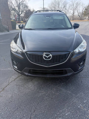 2014 Mazda CX-5 for sale at Ramara Auto Broker, LLC in Loganville GA