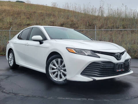 2019 Toyota Camry for sale at Planet Cars in Fairfield CA