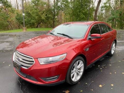 2013 Ford Taurus for sale at Lighthouse Auto Sales in Holland MI