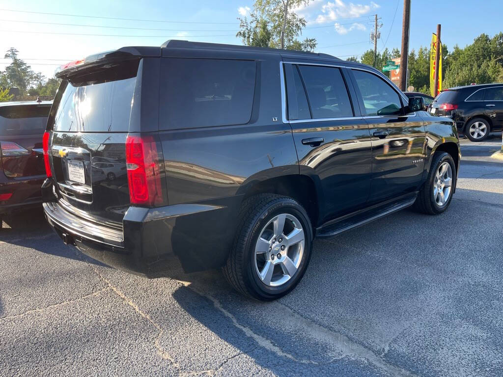 2015 Chevrolet Tahoe for sale at INTEGRITY AUTO in Dothan, AL