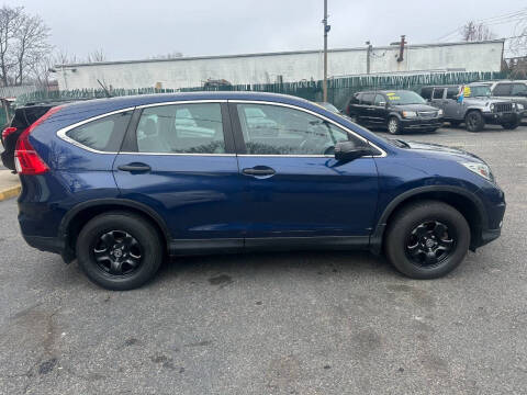 2015 Honda CR-V for sale at King Auto Sales INC in Medford NY
