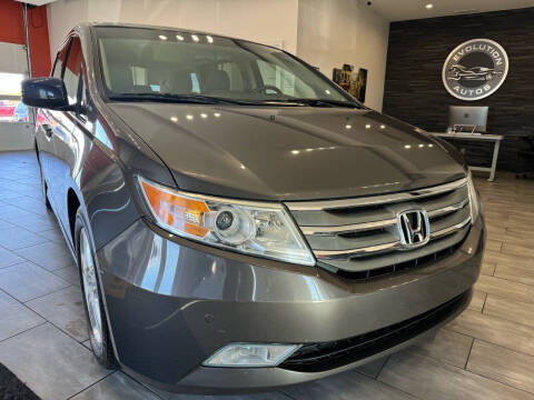 2012 Honda Odyssey for sale at Evolution Autos in Whiteland IN