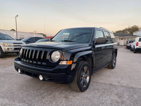 2014 Jeep Patriot for sale at ONYX AUTOMOTIVE, LLC in Largo FL