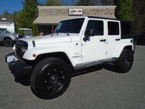 2013 Jeep Wrangler Unlimited for sale at Driven Pre-Owned in Lenoir NC
