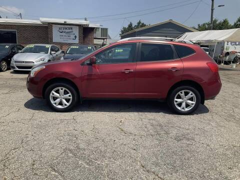 2009 Nissan Rogue for sale at Autocom, LLC in Clayton NC
