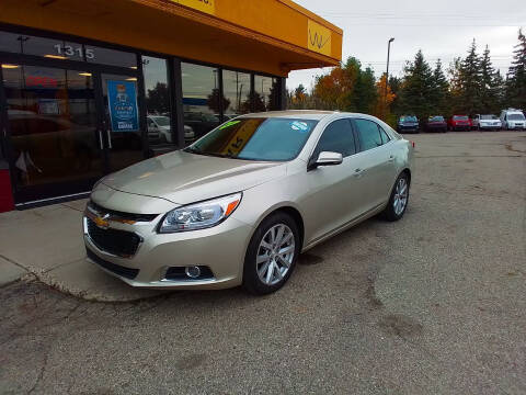 2015 Chevrolet Malibu for sale at WANTCAR in Lansing MI