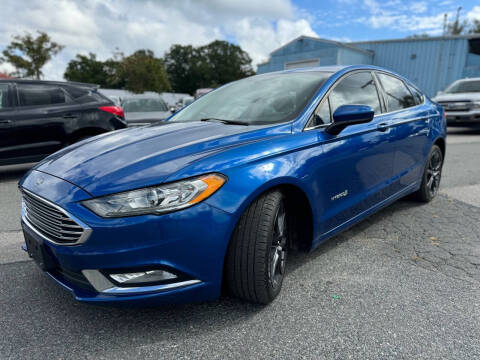 2018 Ford Fusion Hybrid for sale at MGM Auto Group in Framingham MA