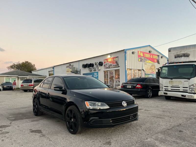 2014 Volkswagen Jetta for sale at ONYX AUTOMOTIVE, LLC in Largo FL
