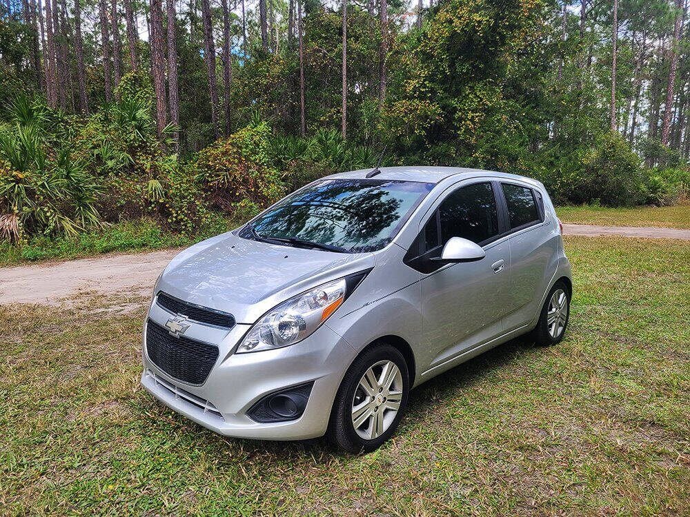 2013 Chevrolet Spark for sale at Flagler Auto Center in Bunnell, FL