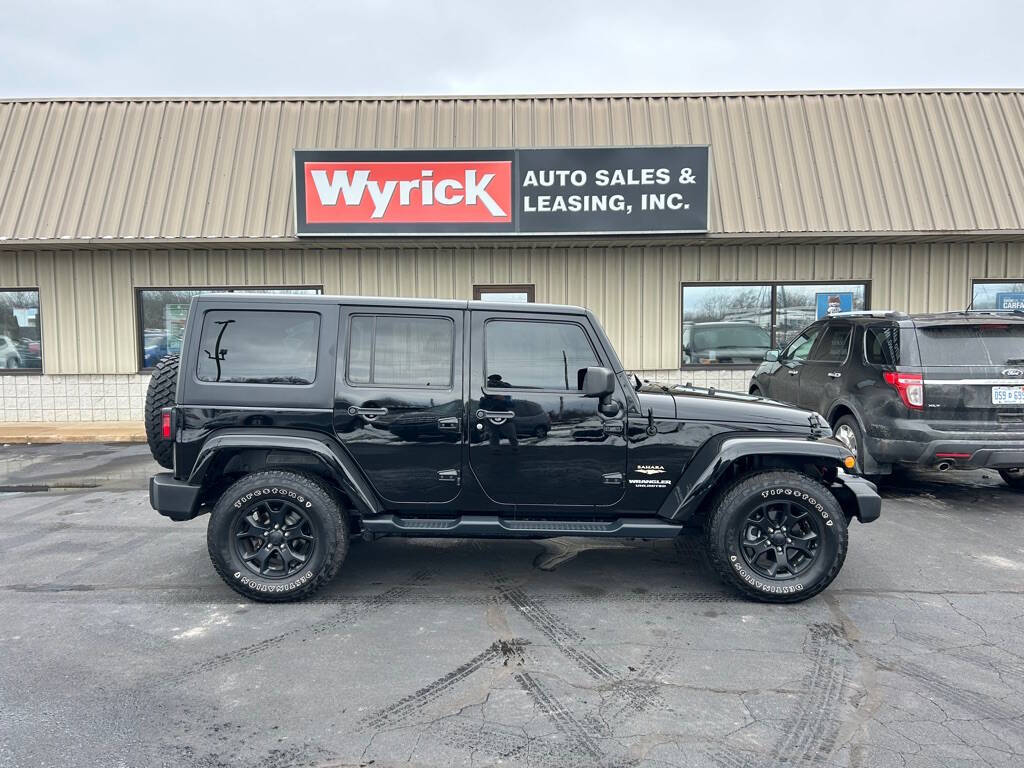 2015 Jeep Wrangler Unlimited for sale at Wyrick Auto Sales & Leasing Inc in Holland, MI